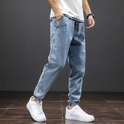 Pantalon de jogging en denim extensible pour homme
