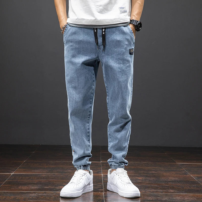 Pantalon de jogging en denim extensible pour homme